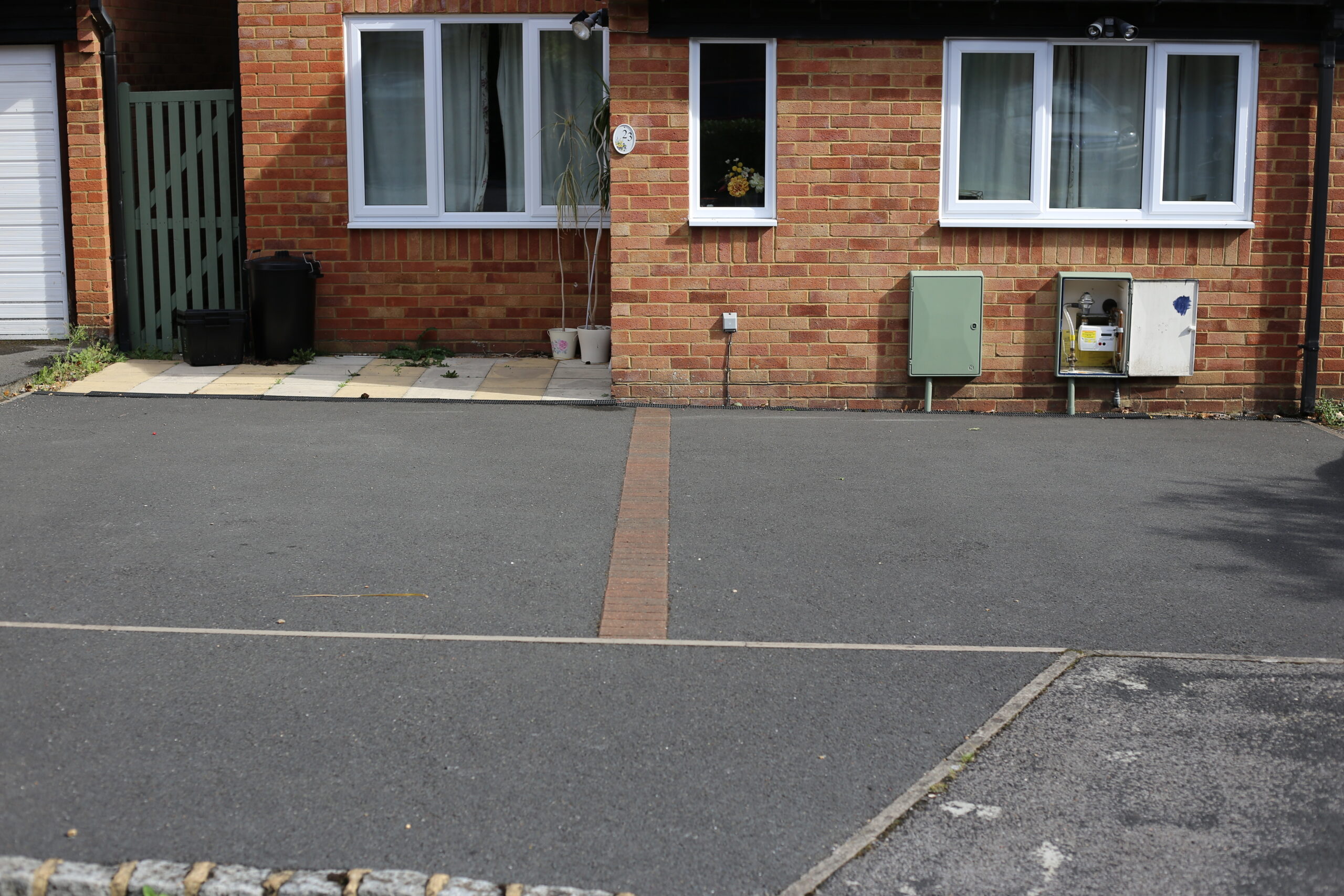 Tarmac driveway with a block paving border